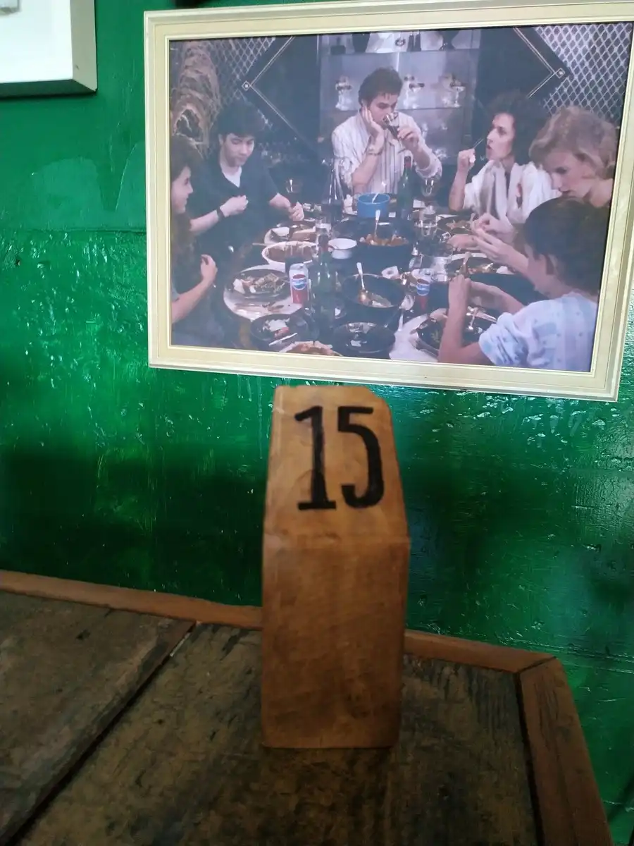 A café sign with the number 15