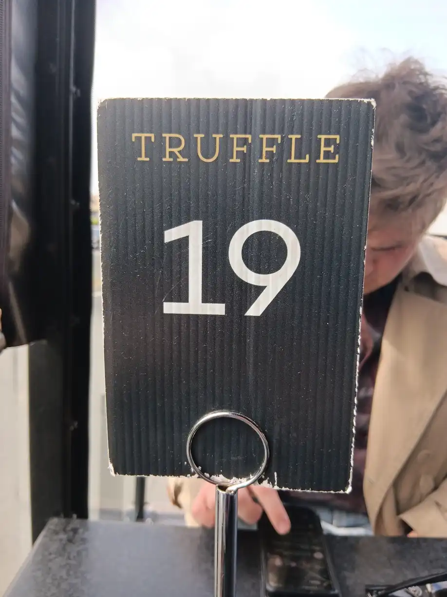 A café sign with the number 19