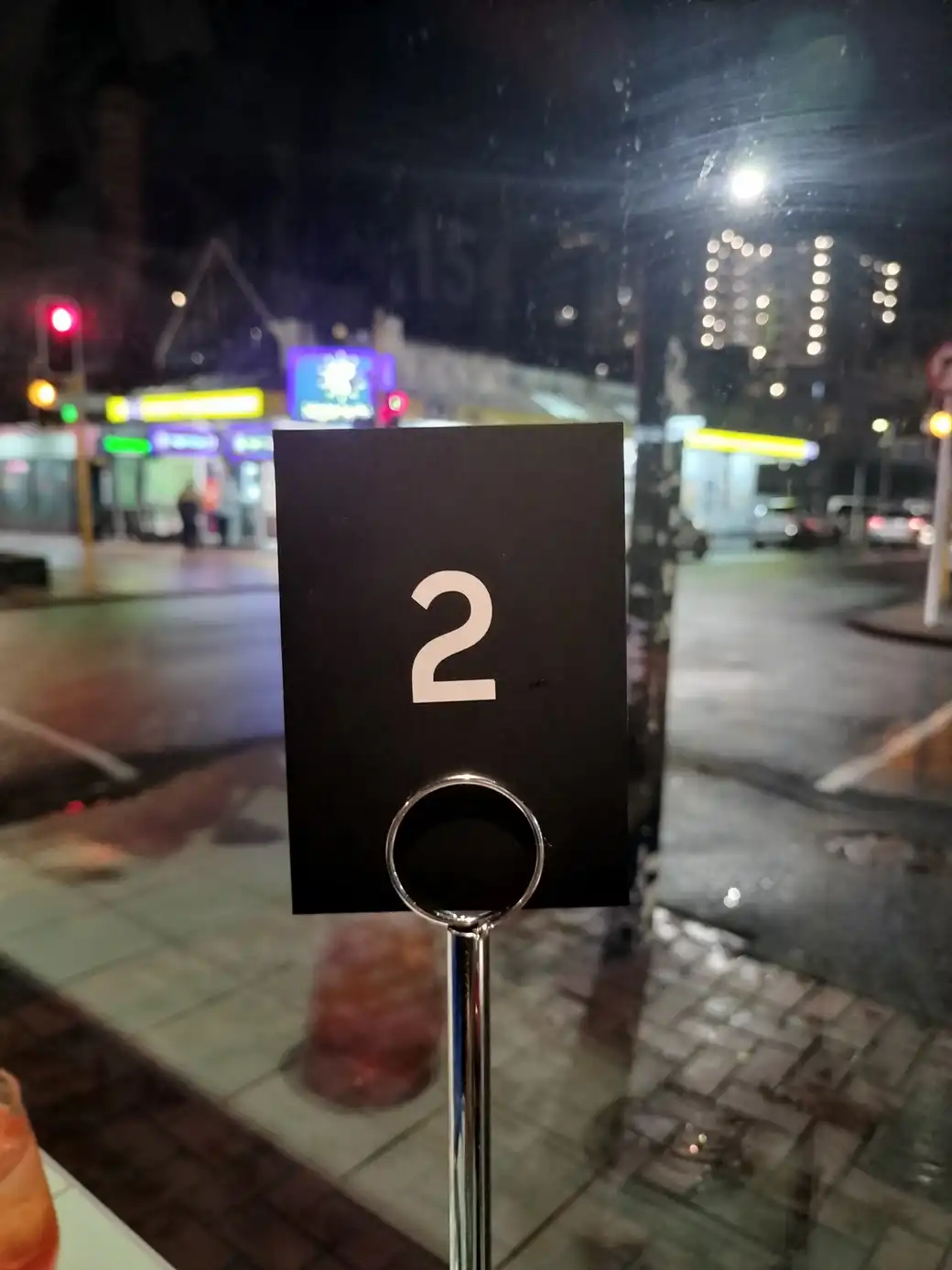 A café sign with the number 2
