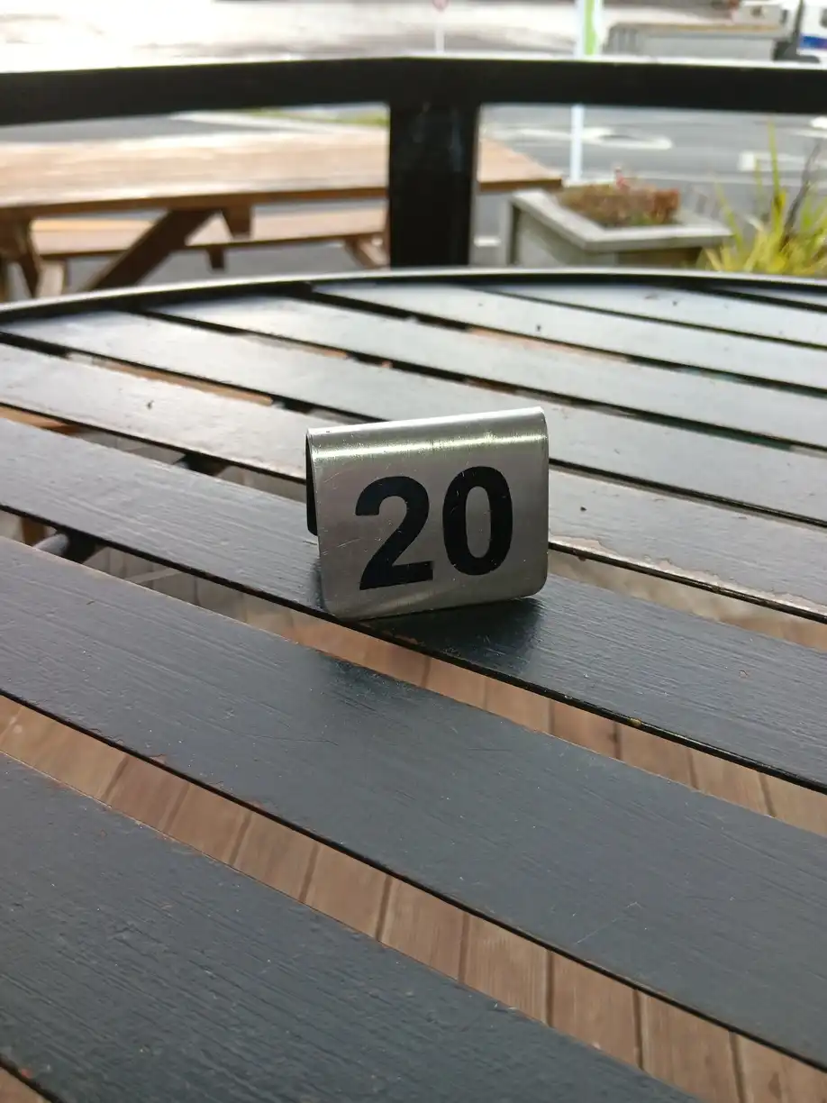 A café sign with the number 20