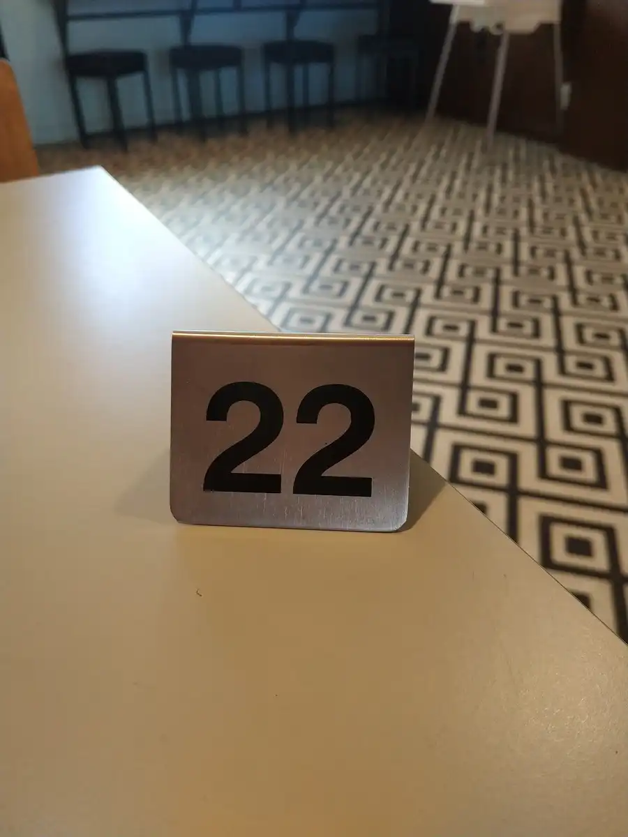 A café sign with the number 22