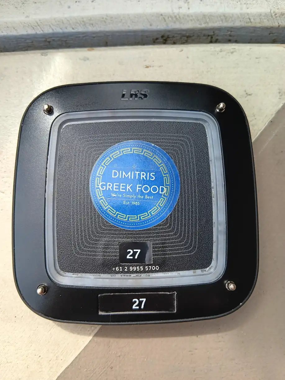 A café sign with the number 27