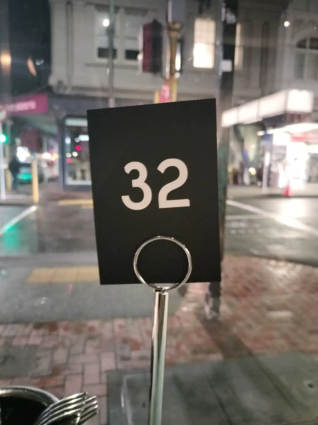 A café sign with the number 32