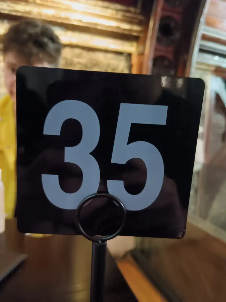 A café sign with the number 35