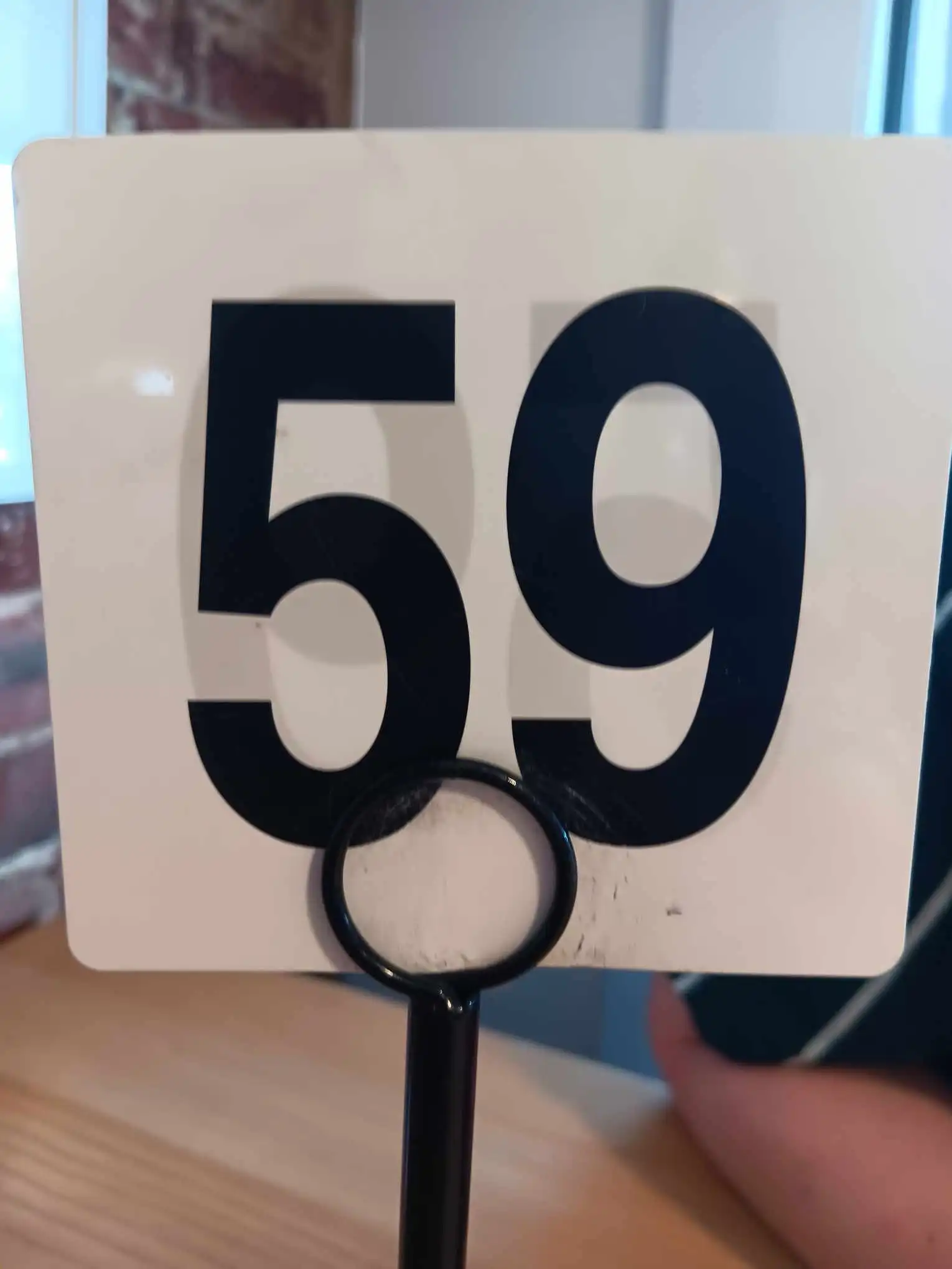 A café sign with the number 59