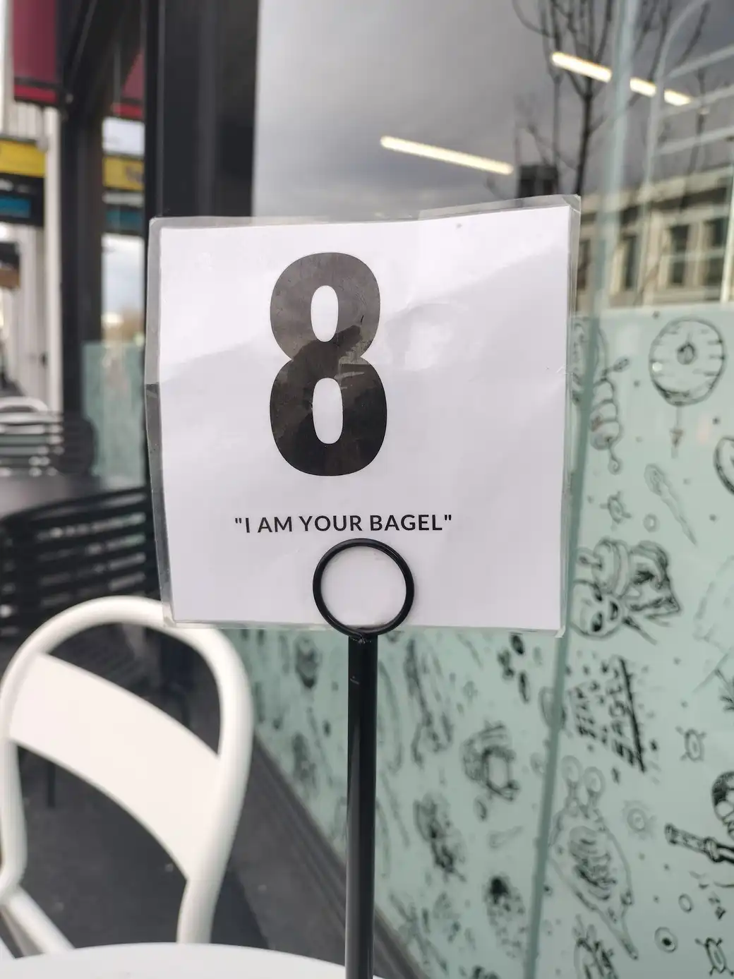 A café sign with the number 8